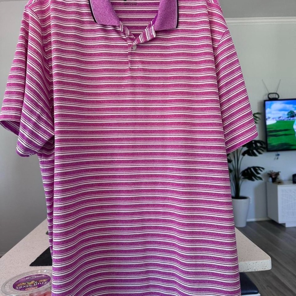 Nike Dri-Fit pink and white striped polo shirt
